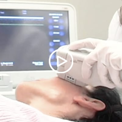 Woman getting Skin Tightening Procedure at Cosmetic Medical Clinic - Laser Skin Treatment Specialists